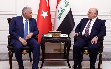 Turkish Prime Minister Binali Yildirm (L) and Iraqi Prime Minister Haider al-Abadi (R) met in Baghdad on Saturday. Photo: Official