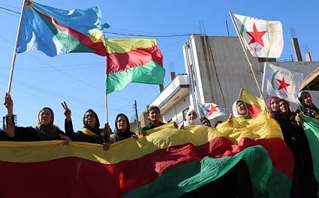 Supporters of the Kurdish Democratic Union Party (PYD) in Rojava, or northern Syria. AFP photo.