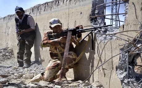 AFP file photo of Syrian regime forces at Deir ez-Zor airport in eastern Syrian. 