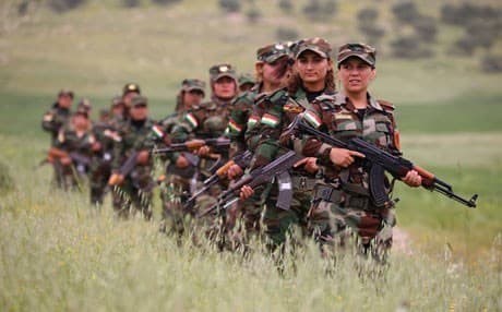 Members of the Rojava Peshmerga force known as Roj Brigade pictured in Kurdistan Region. Photo:Rudaw