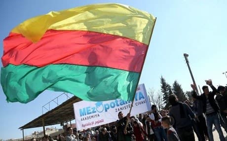 The official flag of the Kurdish region in Syria, also known as Rojava. The Kurdish authorities have established their own cantons, and have proposed a draft constitution late December, which notably dropped  the Rojava word from the official name of the region, instead  proposing a name which they claim will be more  inclusive. It calls itself the Democratic Federal System of Northern Syria. Photo: AFP
