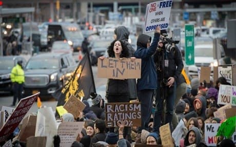 Protesters opposed to US President Donald Trump's executive order banning citizens of seven Muslim-majority countries gather at New York's JFK airport over the weekend. Photo: AFP