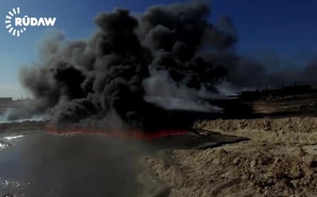 File photo of a burning oil well in Qayyara. 