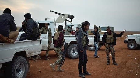Opposition units linked to the Free Syrian Army arrive near al-Bab. Photo: AA
