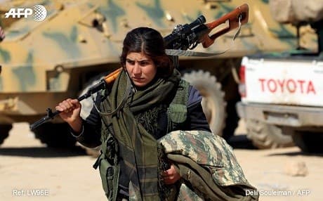 An SDF fighter in the village of Sabah al-Khayr near Raqqa on February 21. Photo: Delil Souleiman/AFP