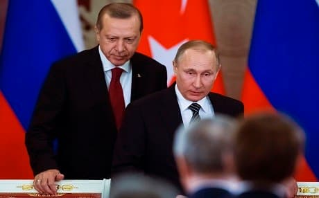 Russian President Vladimir Putin (R) and Turkey's President Recep Tayyip Erdogan arrive to attend a news conference after their talks at the Kremlin in Moscow on March 10. Photo: AFP