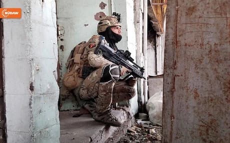 An Iraqi army soldier takes a break from fighting ISIS militants in west Mosul as clashes continue. Rudaw photo