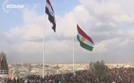 The Kurdish flag being raised in Kirkuk last week. Photo: Rudaw video