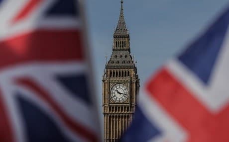 United Kingdom flags fly near the Houses of Parliament, comprising the House of Commons and the House of Lords, in London in March. Photo: AFP