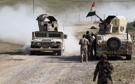 Members of the Iraqi forces advance against the ISIS group north of Mosul on Thursday. The Iraqi and Kurdish security forces launched a joint military offensive against the extremist group in Mosul since last October backed by the US-led anti-ISIS global coalition. The joint military cooperation between Erbil and Baghdad has been described as historical by both sides. Photo: AFP/Ahmad al-Rubaye