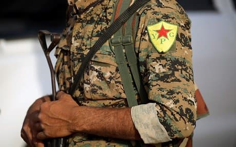 A member of the Kurdish People's Protections Units (YPG) takes part in the US-backed offensive launched since last November to oust ISIS from Raqqa, the de facto capital of the extremist group in Syria. File photo: AFP/Delil Souleiman