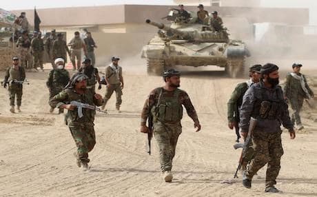 AFP file photo of Shiite Hashd al-Shaabi fighters in west Mosul.