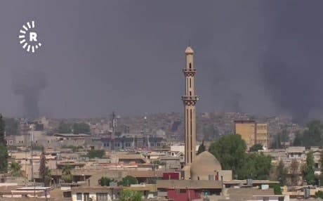 Smoke billows above war-torn western Mosul near Nur Mosque on Saturday. Photo: Rudaw