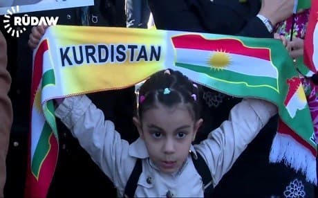 A Faili Kurdish girl carries a Kurdistan flag during a march in Erbil last year.