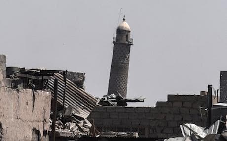 ISIS blew up the Al-Hadba Minaret in west Mosul, Iraq on June 21, 2017. Photo: AFP/Mohamed El-Shahed