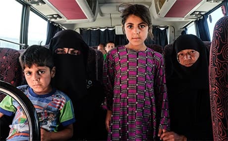 People flee from western Mosul in a bus. Photo: Oxfam