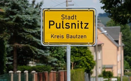 The town sign of Pulsnitz near Dresden, eastern Germany, is pictured on July 24. Photo: Sebastian Willnow | AFP
