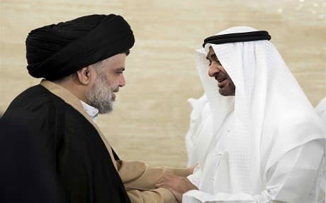 Sheikh Mohamed bin Zayed al-Nahyan (right), Crown Prince of Abu Dhabi and Deputy Supreme Commander of the UAE Armed Forces, shakes hands with Iraqi Shiite leader Muqtada al-Sadr following a meeting in Abu Dhabi on August 14. Photo: Rashed al-Masoori | AFP/WAM