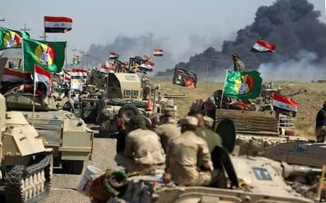 Iraqi troops and Shiite Hashd al-Shabai advance towards liberated Hawija in south Kirkuk on October 4. Photo: AFP/Ahmad al-Rubaye