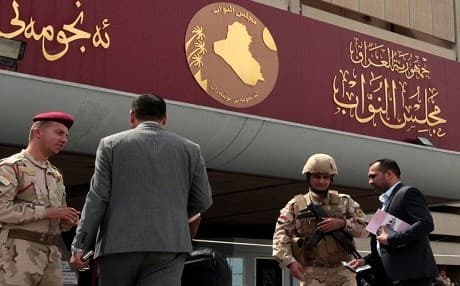 Iraqi security forces stand guard outside the parliament in Baghdad. File photo: AFP