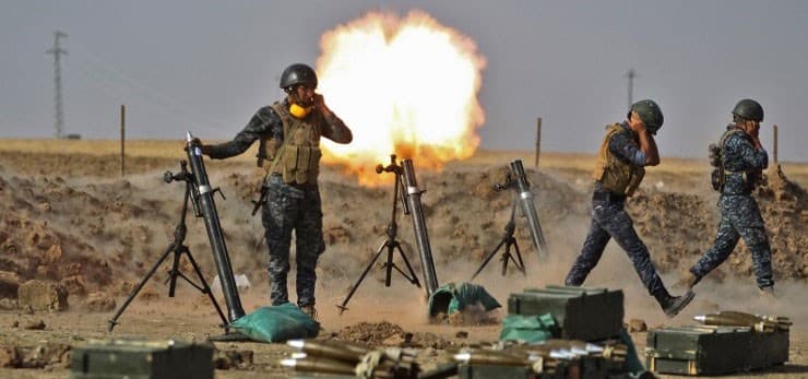 Iraqi forces fire mortars at Peshmerga positions near Fishabur on Thursday. Photo: Ahmad al-Rubaye/AFP