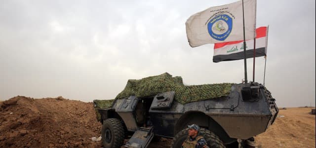 Iraqi forces gather at their camp on the front line in the northwestern town of Fishkhabur, near the borders with Syria and Turkey, on October 28, 2017. Photo: AFP / Ahmad al-Rubaye 