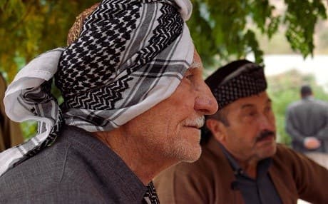 Mohammad Amin sits next to Abdulrahman Faqe Khidir at his home in Sheikh Wasanan village, Balisan Valley, Kurdistan Region. Photo Credit: @levi.life