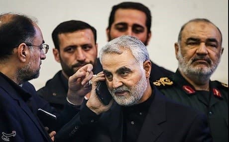 Qasem Soleimani [C], commander of the Iranian Quds Force, receives a phone call from the head of the Palestinian Hamas organization in November, 2017 to express condolences to the death of Soleiman's father. File photo: Tasnim News Agency