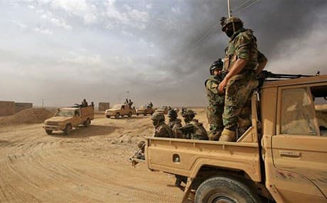 Iraqi and Hashd al-Shaabi forces advance on al-Qaim in western Anbar province in early November. Photo: AFP