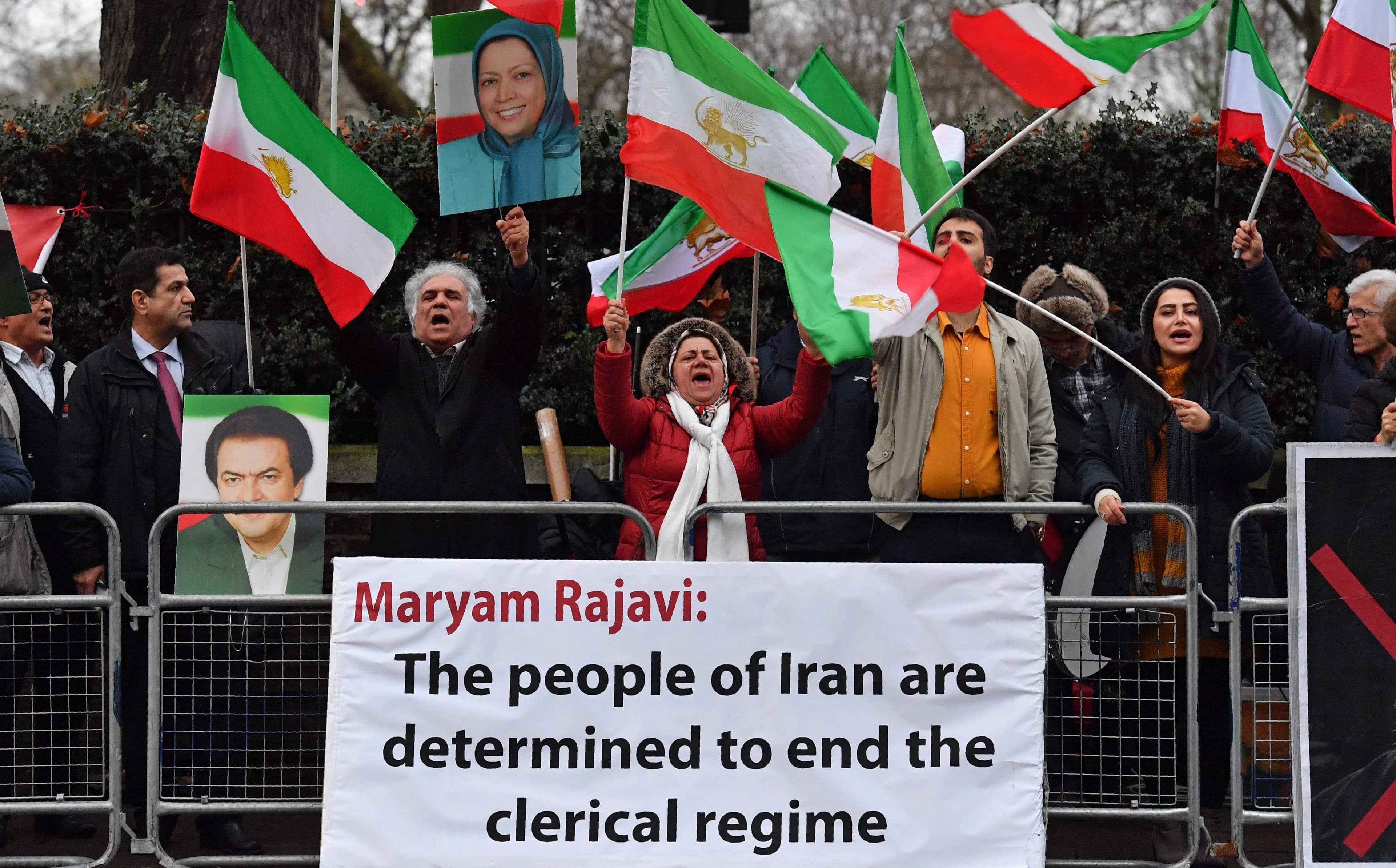Protesters gather in front of the Iranian Embassy in London on Tuesday, supporting anti-government demonstrations in Iran. Photo: Ben Stansall/AFP