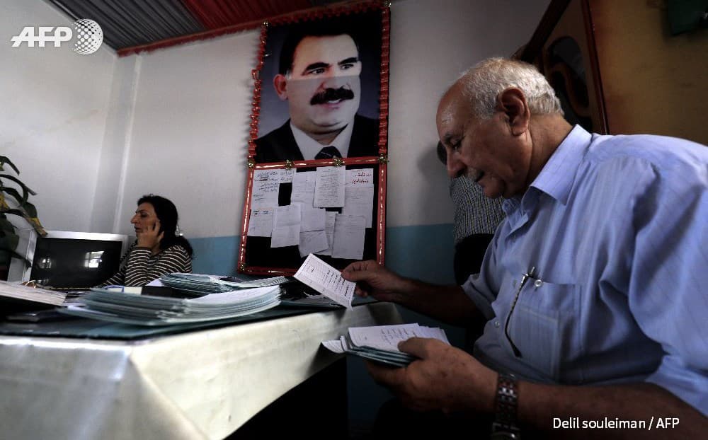 Kurdish officials prepare for the first round of elections that were held on September 22. Photo: Delil Souleiman/AFP