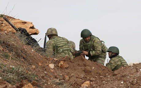 Turkish soldiers are seen around the area of Mount Bersaya, north of the Syrian town of Azaz near the border with Turkey, on January 22, 2018. Photo: Abo Ghaloun
