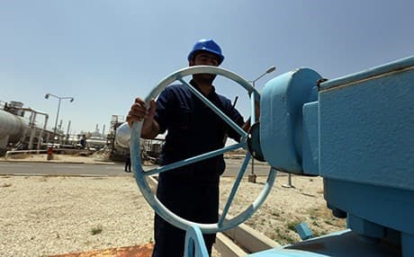 An employee works at an oil facility in the Kurdistan Region. Photo: Rudaw file