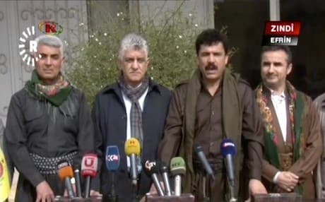 A visiting Kurdish parliament delegation speaking to the press in Afrin city on February 12, 2018. Photo: Rudaw TV via Ronahi TV