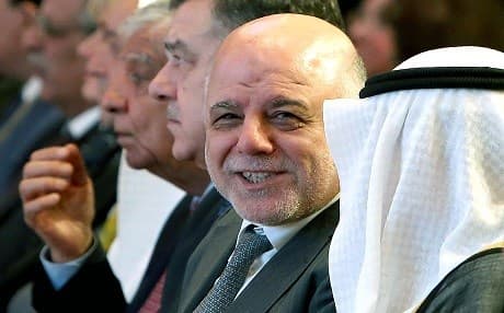 Iraqi Prime Minister Haider al-Abadi looks on during the Kuwait international conference for the reconstruction of Iraq on February 13, 2018. Photo: Yasser al-Zayyat | AFP