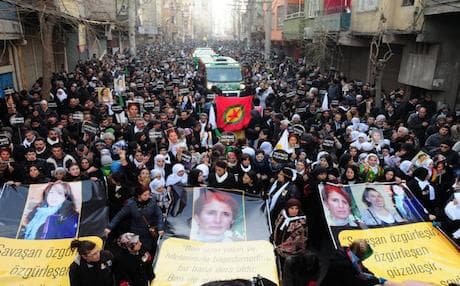 Thousands of Kurds carry banners in Diyarbakir in January 2013 bearing pictures of Cansiz and two associates killed in France. Photo AFP