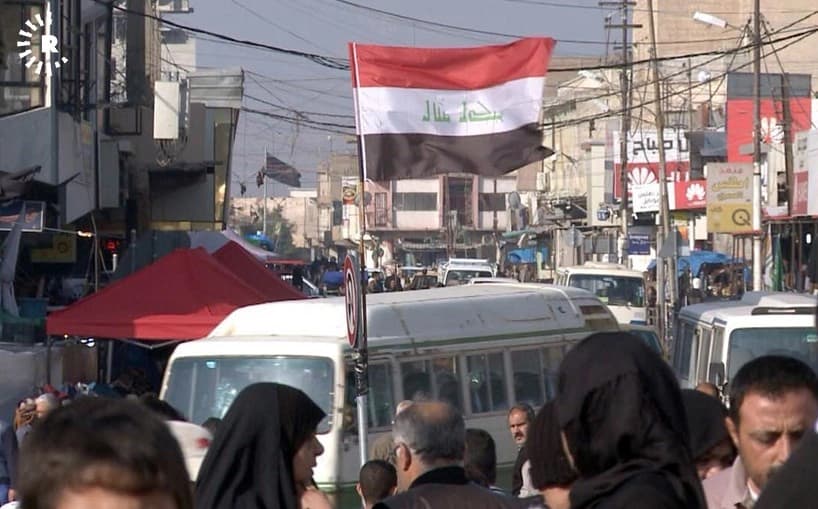 An Iraqi flag flying in Kirkuk last December. Photo: Hiwa Hussamadin/Rudaw