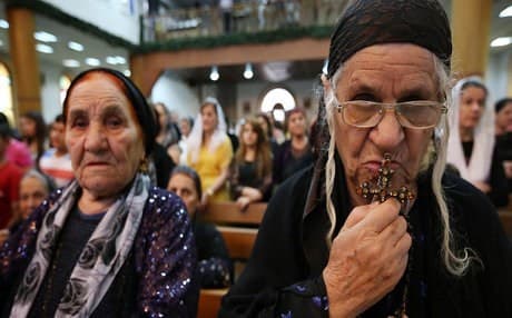 Iraqi Christians during a mass at the Saint-Joseph church in Erbil. File photo: AFP