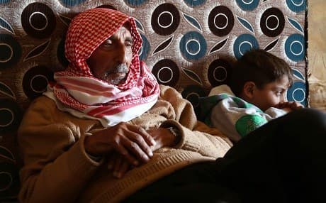 People take cover in a cellar in the village of Qastal Koshk, north of Afrin on March 16, 2018, amid battles between Turkish-backed forces and Kurdish fighters. Photo: Nazeer al-Khatib | AFP