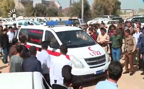 Hundreds of people gathered to bury one of the civilians killed by Turkish airstrikes on March 22, 2018. Photo: Rudaw TV
