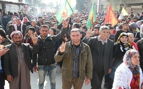 People in Afrin flash the V sign in Afrin in late February, 2018. Photos by author