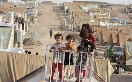 Syrian Kurdish children play at a refugee camp in Kurdistan Region's Duhok province. Photo: AFP
