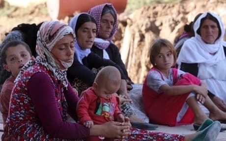 Kurdish Yazidis who fled their homes when ISIS militants attacked the town of Shingal in 2014. File photo: AP 