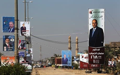This picture taken on April 24, 2018, shows electoral posters in Fallujah ahead of the parliamentary elections. Photo: Ahmad al-Rubaye | AFP