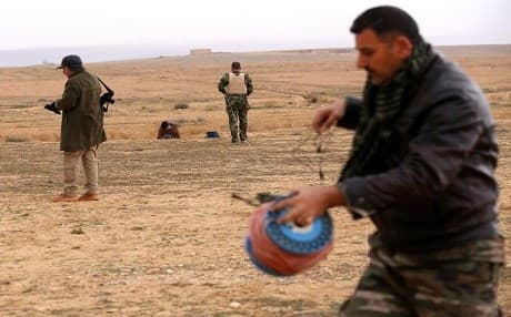 Peshmerga work on detonating landmines planted by ISIS on the outskirts of the village of Sinune in Shingal's Nineveh on January 15, 2015. File photo: Safin Hamed | AFP