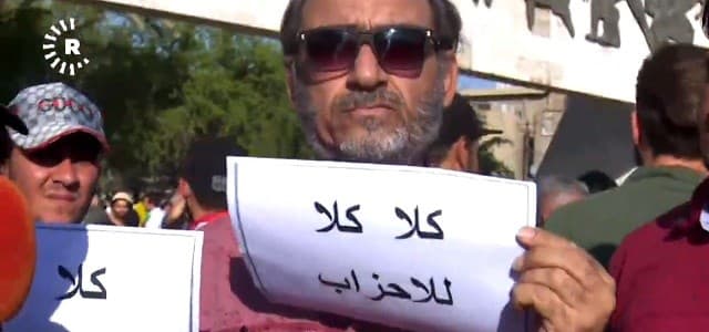 ‘No, no to political parties,’ is a common statement on signs in Baghdad’s Tahrir Square on Friday. Photo: Rudaw