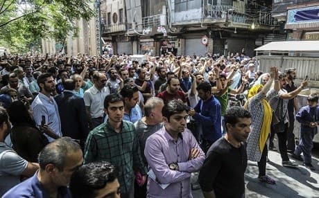 A group of protesters chant slogans at the old Grand Bazaar in Tehran, Iran, on June 25, 2018. Photo: AP