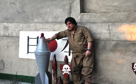 At Ali’s home there is a whole collection of mines and explosives, including the mine that took off his own leg.  Photo: Deniz Serinci