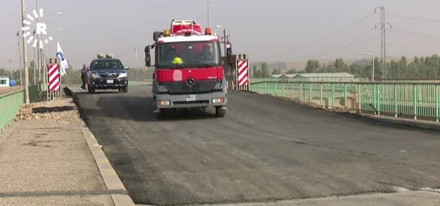 A vehicle crosses a repaired bridge connecting the provinces of Erbil and Kirkuk in the Kurdistan Region of Iraq on August 19, 2018. Photo: Rudaw TV