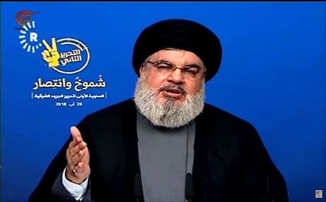 Hassan Nasrallah, head of the Lebanese Hezbollah, broadcasts a speech on the group's Al-Manar channel, August 26, 2018. Photo: Al-Manar / Rudaw video